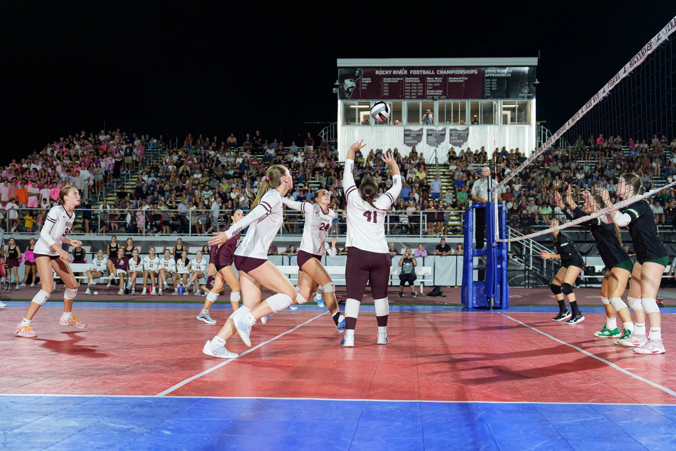 Outdoor volleyball court under the lights